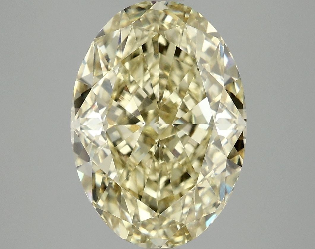 Loose Diamond - OVAL 5.07ct Fancy Intense Yellow VVS2: Loose Diamond - OVAL 5.07ct Fancy Intense Yellow VVS2 Source: This is a real non-mined Diamond that has been grown in a lab Shape: OVAL Carats: 5.07 Color: Fancy Intense Yellow Certification: IGI