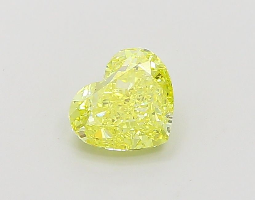 Loose Diamond - HEART 1.22ct Fancy Vivid Yellow VVS2: Loose Diamond - HEART 1.22ct Fancy Vivid Yellow VVS2 Source: This is a real non-mined Diamond that has been grown in a lab Shape: HEART Carats: 1.22 Color: Fancy Vivid Yellow Certification: IGI