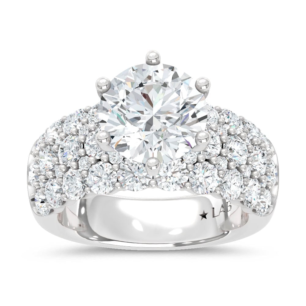 14K White Gold Lab Grown Diamond 5 1/2 Ct.Tw. Round Shape Engagement Ring (IGI Certified Center 3ct): 14K White Gold Lab Grown Diamond 5 1/2 Ct.Tw. Round Shape Engagement Ring (IGI Certified Center 3ct) ( Center 3 ct) 14k White Gold Stone Color: D-f Stone Clarity: Vs Each ring is presented in standard