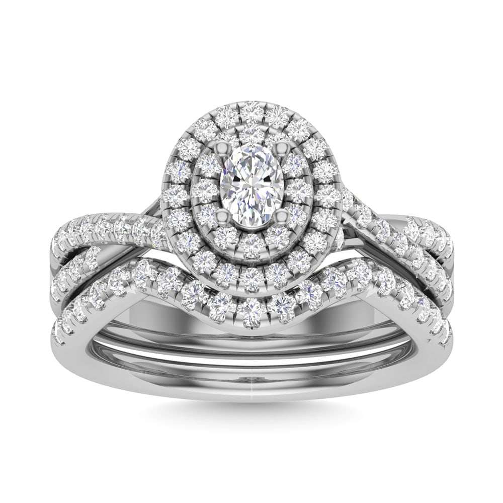 Diamond 1 Ct.Tw. Oval Cut Bridal Ring in 14K White Gold: Diamond 1 Ct.Tw. Oval Cut Bridal Ring in 14K White Gold Diamond 1 Ct.Tw. Oval Cut Bridal Ring in 14K White Gold 14k White Gold Stone Color: G-h Stone Clarity: I2 Each ring is presented in standard siz