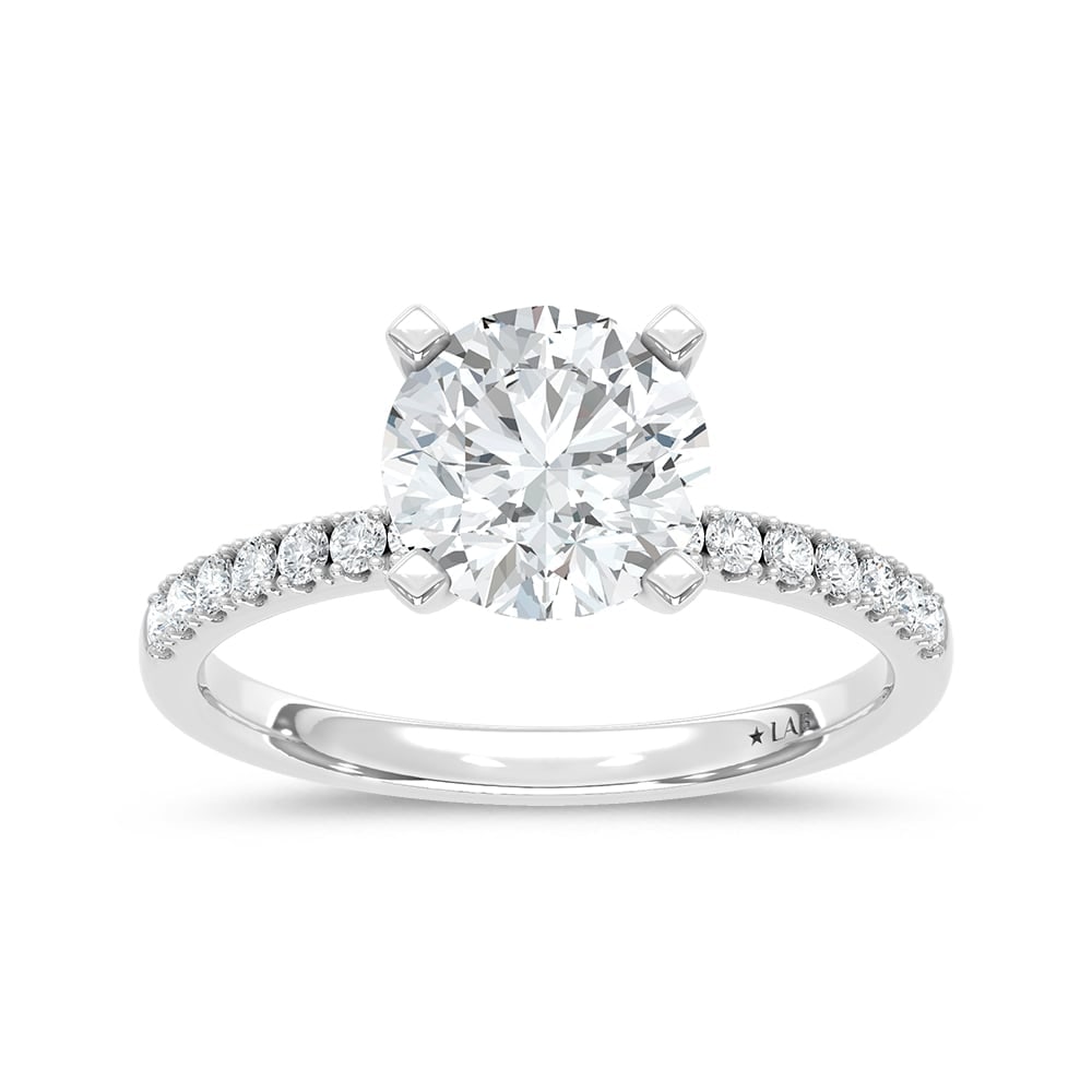 14K White Gold Lab Grown Round Diamond 2 1/4 Ct.Tw. Engagement Ring: 14K White Gold Lab Grown Round Diamond 2 1/4 Ct.Tw. Engagement Ring This elegant diamond engagement ring crafted in 14k Whote gold, features a Round -cut center stone of 2 ct that creates a stunning s