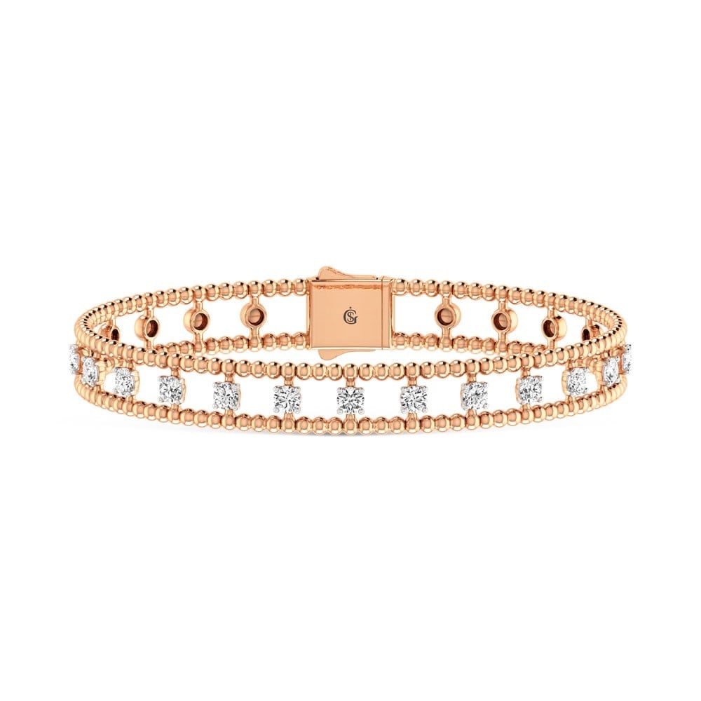 14K Rose Gold Lab Grown Yellow and White Diamond 1 1/3 Ct.Tw Flexi Bangle: 14K Rose Gold Lab Grown Yellow and White Diamond 1 1/3 Ct.Tw Flexi Bangle This 14K Rose Gold flexi bangle features lab grown yellow and white diamonds totaling 1 1/3 Ct.Tw., offering stylish and vibra