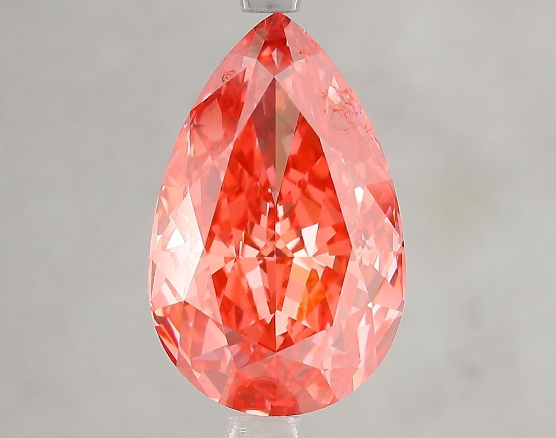 Loose Diamond - PEAR 5.11ct Fancy Vivid Red VS2: Loose Diamond - PEAR 5.11ct Fancy Vivid Red VS2 Source: This is a real non-mined Diamond that has been grown in a lab Shape: PEAR Carats: 5.11 Color: Fancy Vivid Red Certification: IGI Video: