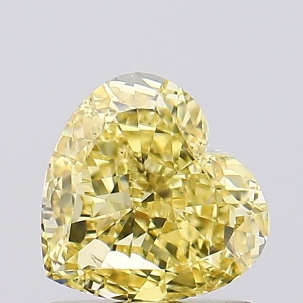 Loose Diamond - HEART 1.02ct Fancy Vivid Yellow VS2: Loose Diamond - HEART 1.02ct Fancy Vivid Yellow VS2 Source: This is a real non-mined Diamond that has been grown in a lab Shape: HEART Carats: 1.02 Color: Fancy Vivid Yellow Certification: IGI Video: