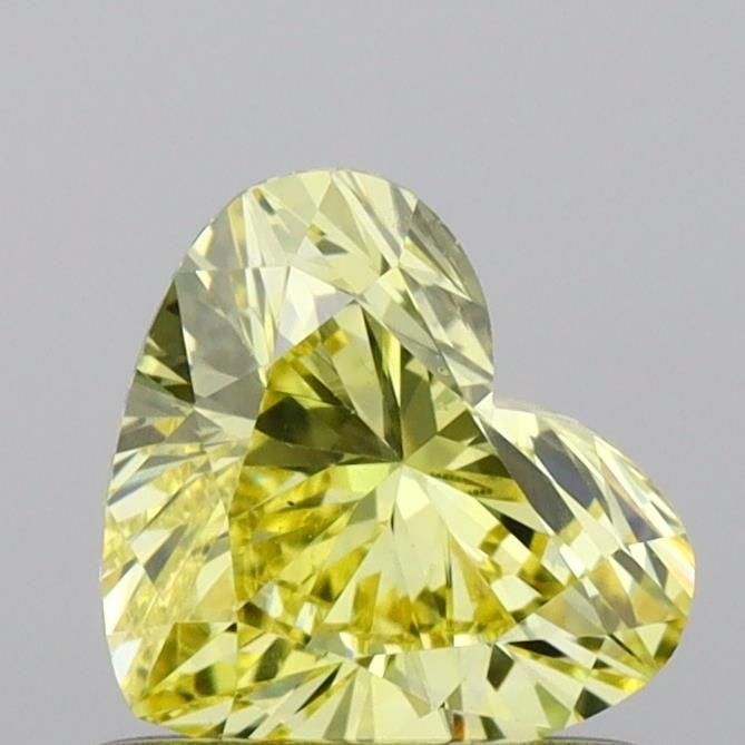 Loose Diamond - HEART 0.68ct Fancy Vivid Yellow VS1: Loose Diamond - HEART 0.68ct Fancy Vivid Yellow VS1 Source: This is a real non-mined Diamond that has been grown in a lab Shape: HEART Carats: 0.68 Color: Fancy Vivid Yellow Certification: IGI Video:
