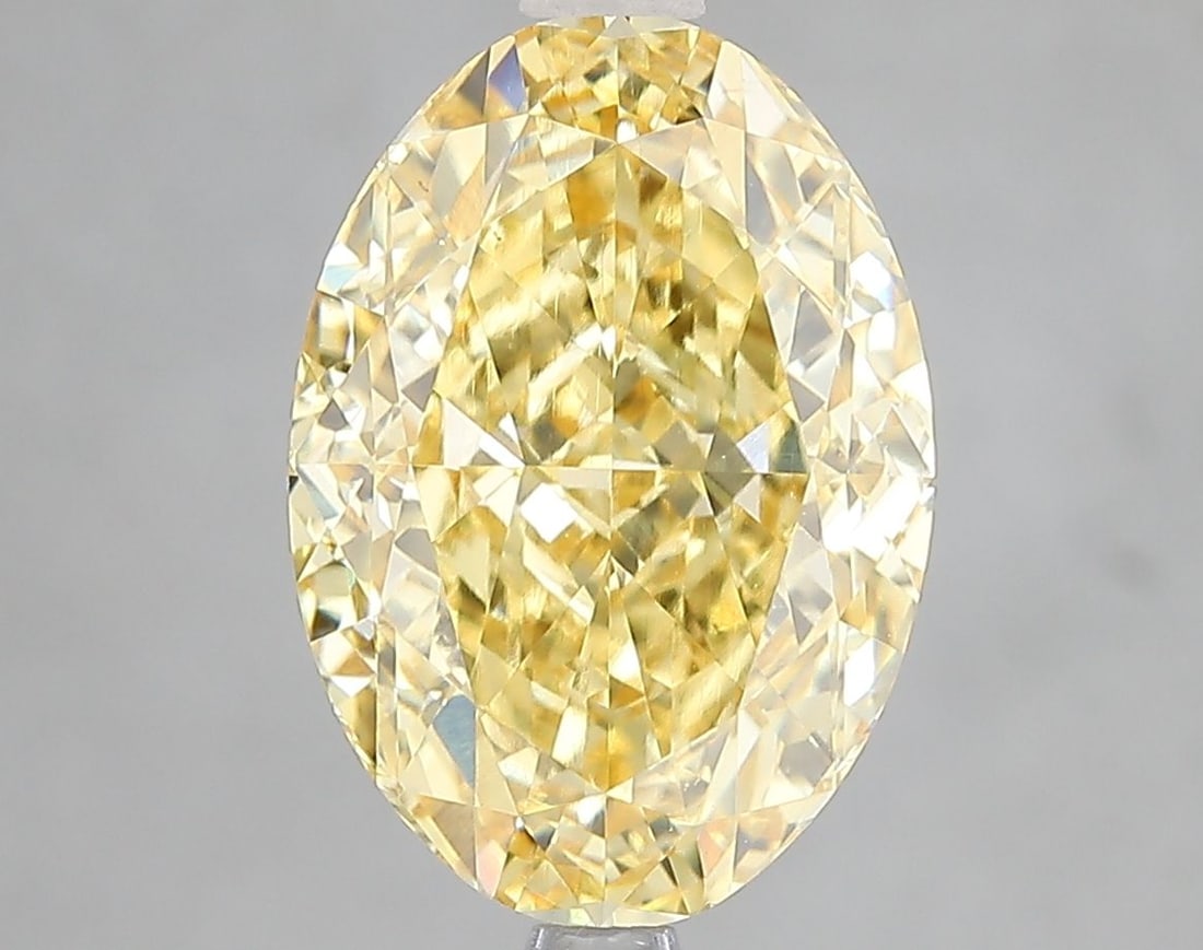 Loose Diamond - OVAL 5.1ct Fancy Vivid Yellow VS1: Loose Diamond - OVAL 5.1ct Fancy Vivid Yellow VS1 Source: This is a real non-mined Diamond that has been grown in a lab Shape: OVAL Carats: 5.1 Color: Fancy Vivid Yellow Certification: IGI Video: