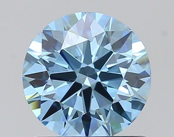 Ideal Loose Diamond - ROUND 0.79ct Fancy Vivid Blue VVS2: Ideal Loose Diamond - ROUND 0.79ct Fancy Vivid Blue VVS2 Source: This is a real non-mined Diamond that has been grown in a lab Shape: ROUND Carats: 0.79 Color: Fancy Vivid Blue Certification: IGI 