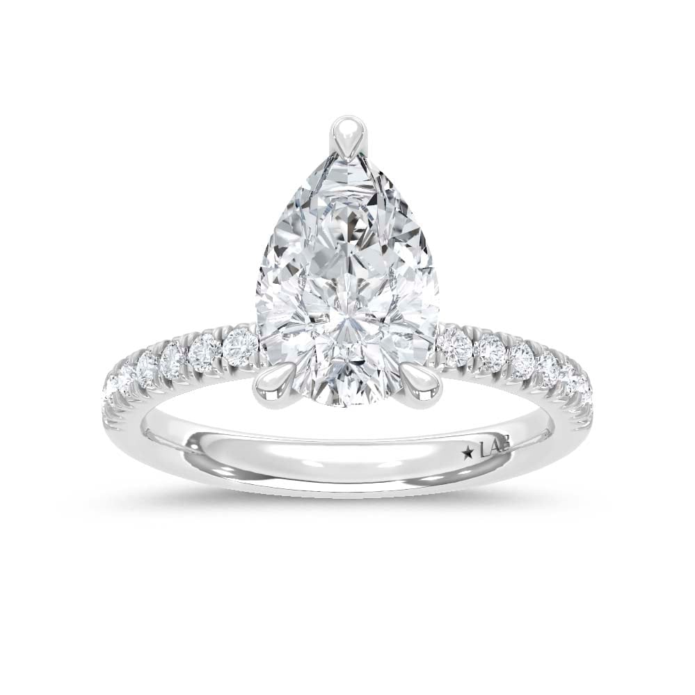 14K White Gold Lab Grown Diamond 2 1/3 Ct.Tw. Engagement Ring (Center Pear 2 Ctw): 14K White Gold Lab Grown Diamond 2 1/3 Ct.Tw. Engagement Ring (Center Pear 2 Ctw) Discover subtle brilliance and modern elegance with our Hidden Halo Diamond Engagement Ring. This elegant engagement