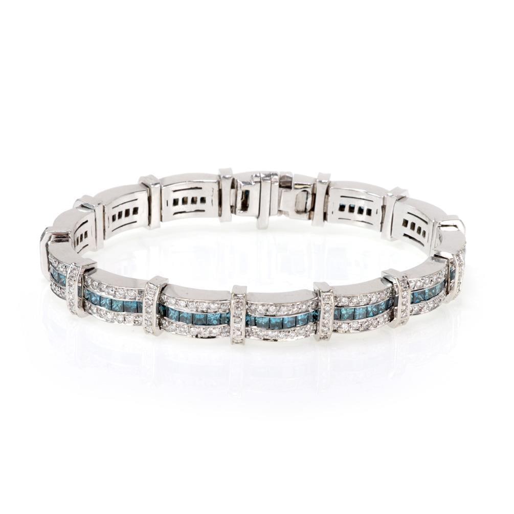 18k White Gold Blue & White Diamond Wide Curve Link Bracelet 10 Carats: 18k White Gold Blue & White Diamond Wide Curve Link Bracelet 10 Carats This stunning bracelet is expertly crafted from 18k white gold with a polished finish. It features 13 elegantly curved bar links,