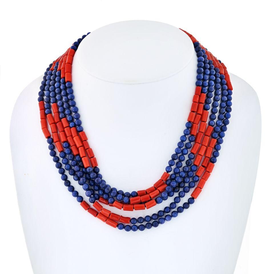 Multi-Strand Lapis and Coral Necklace with Platinum and 18K Gold Clasp: Multi-Strand Lapis and Coral Necklace with Platinum and 18K Gold Clasp This David Webb necklace features multiple strands with alternating rows of rectangular coral and round lapis lazuli beads. The c