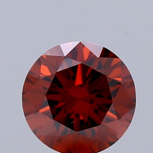 Loose Diamond - ROUND 0.69ct Fancy Deep Orange SI1: Loose Diamond - ROUND 0.69ct Fancy Deep Orange SI1 Source: This is a real non-mined Diamond that has been grown in a lab Shape: ROUND Carats: 0.69 Color: Fancy Deep Orange Certification: IGI Video: