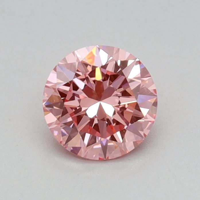 Loose Diamond - ROUND 0.39ct Fancy Vivid Pink VVS2: Loose Diamond - ROUND 0.39ct Fancy Vivid Pink VVS2 Source: This is a real non-mined Diamond that has been grown in a lab Shape: ROUND Carats: 0.39 Color: Fancy Vivid Pink Certification: IGI Video: