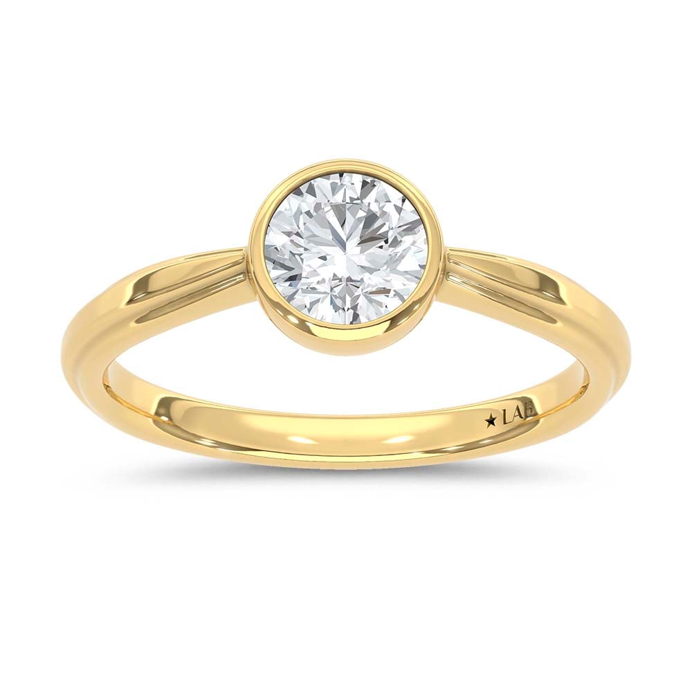 14K Yellow Gold Lab Grown Diamond 3/4 Ct.Tw. Promise Ring: 14K Yellow Gold Lab Grown Diamond 3/4 Ct.Tw. Promise Ring Designed in classic 14K Yellow Gold, this promise ring features lab grown diamonds totaling 3/4 Ct.Tw., blending timeless romance with sparkle