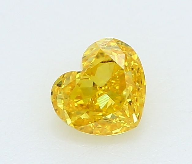 Loose Diamond - HEART 0.19ct Fancy Vivid Yellow VS1: Loose Diamond - HEART 0.19ct Fancy Vivid Yellow VS1 Source: This is a real non-mined Diamond that has been grown in a lab Shape: HEART Carats: 0.19 Color: Fancy Vivid Yellow Certification: IGI Video: