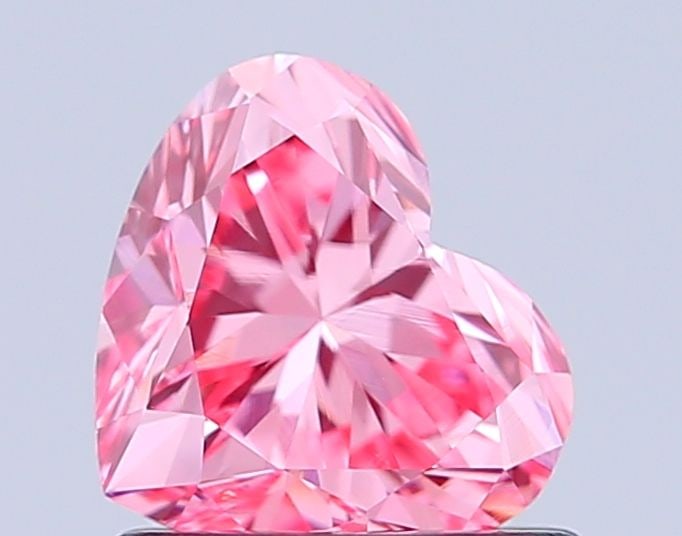 Loose Diamond - HEART 0.89ct Fancy Vivid Pink VVS2: Loose Diamond - HEART 0.89ct Fancy Vivid Pink VVS2 Source: This is a real non-mined Diamond that has been grown in a lab Shape: HEART Carats: 0.89 Color: Fancy Vivid Pink Certification: IGI Video: