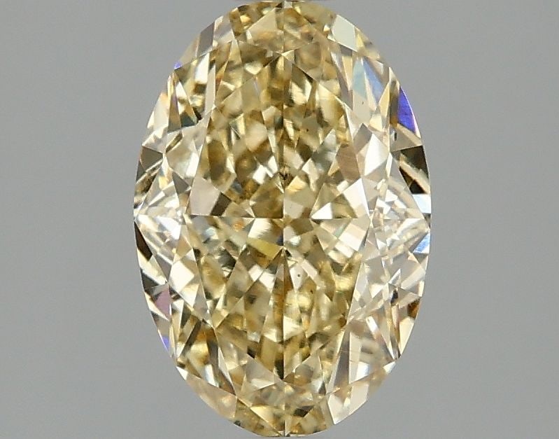 Loose Diamond - OVAL 2.03ct Fancy Intense Yellow VS2: Loose Diamond - OVAL 2.03ct Fancy Intense Yellow VS2 Source: This is a real non-mined Diamond that has been grown in a lab Shape: OVAL Carats: 2.03 Color: Fancy Intense Yellow Certification: IGI