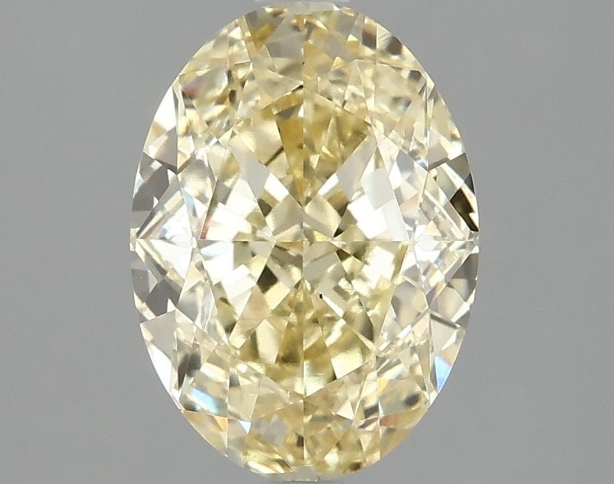 Loose Diamond - OVAL 3.09ct Fancy Vivid Yellow VS1: Loose Diamond - OVAL 3.09ct Fancy Vivid Yellow VS1 Source: This is a real non-mined Diamond that has been grown in a lab Shape: OVAL Carats: 3.09 Color: Fancy Vivid Yellow Certification: IGI Video: