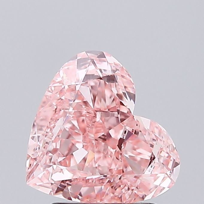 Loose Diamond - HEART 1.91ct Fancy Vivid Pink VVS2: Loose Diamond - HEART 1.91ct Fancy Vivid Pink VVS2 Source: This is a real non-mined Diamond that has been grown in a lab Shape: HEART Carats: 1.91 Color: Fancy Vivid Pink Certification: IGI Video: