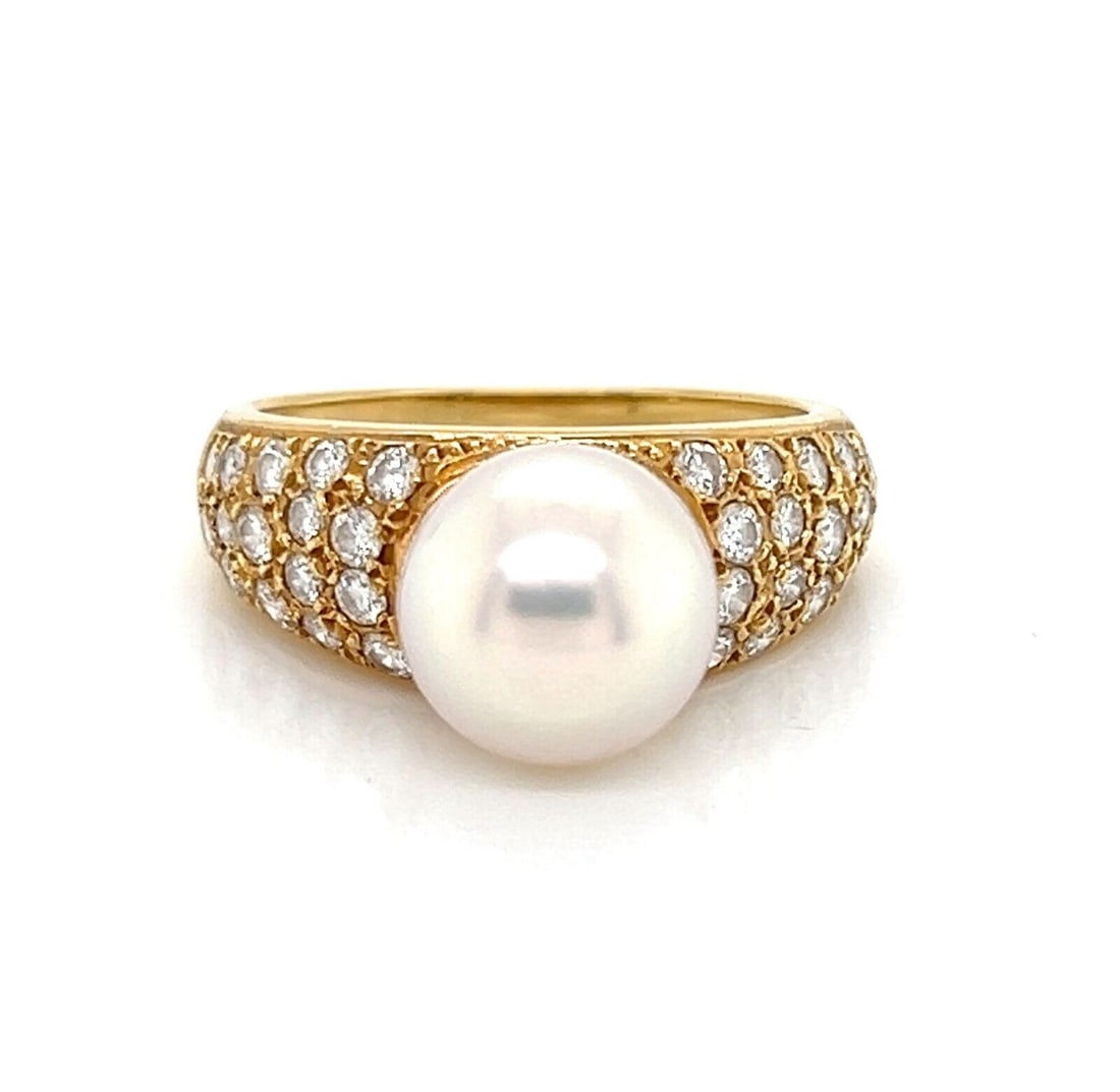 Mikimoto 18k Gold Cocktail Ring with Pearl and Diamond Accents Size 4.75: Mikimoto 18k Gold Cocktail Ring with Pearl and Diamond Accents Size 4.75 This Mikimoto cocktail ring is crafted from 18k yellow gold and features a natural pearl measuring 7-7.5mm, accented with 0.25c