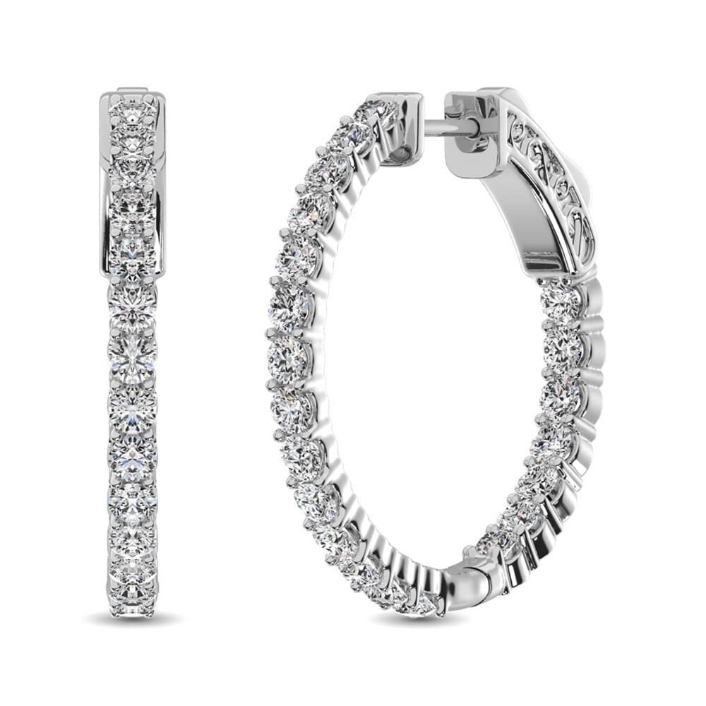 10K White Gold Diamond 1 Ct.Tw. In and Out Hoop Earrings: 10K White Gold Diamond 1 Ct.Tw. In and Out Hoop Earrings These eye-catching earrings are available in 10K White Gold. There are 21 round diamonds with a total carat weight of 1.00Ct.Tw. set in a Prong