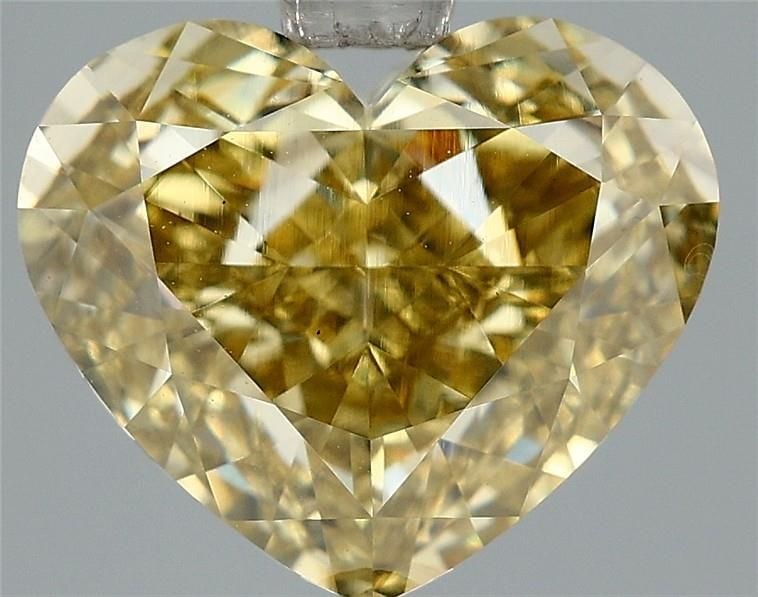 Loose Diamond - HEART 3.32ct Fancy Intense Yellow VS1: Loose Diamond - HEART 3.32ct Fancy Intense Yellow VS1 Source: This is a real non-mined Diamond that has been grown in a lab Shape: HEART Carats: 3.32 Color: Fancy Intense Yellow Certification: IGI The