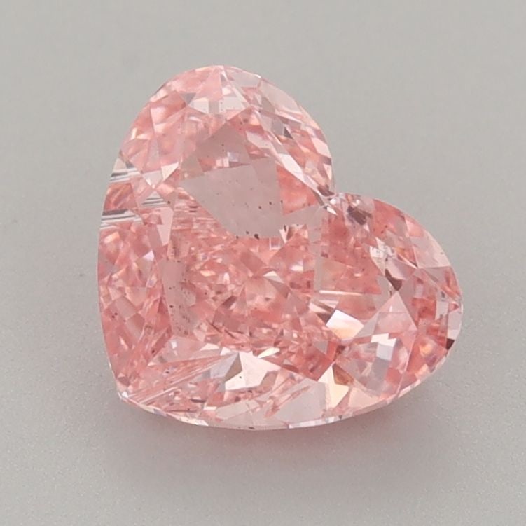 Loose Diamond - HEART 1.6ct Fancy Vivid Pink VS2: Loose Diamond - HEART 1.6ct Fancy Vivid Pink VS2 Source: This is a real non-mined Diamond that has been grown in a lab Shape: HEART Carats: 1.6 Color: Fancy Vivid Pink Certification: IGI Video:
