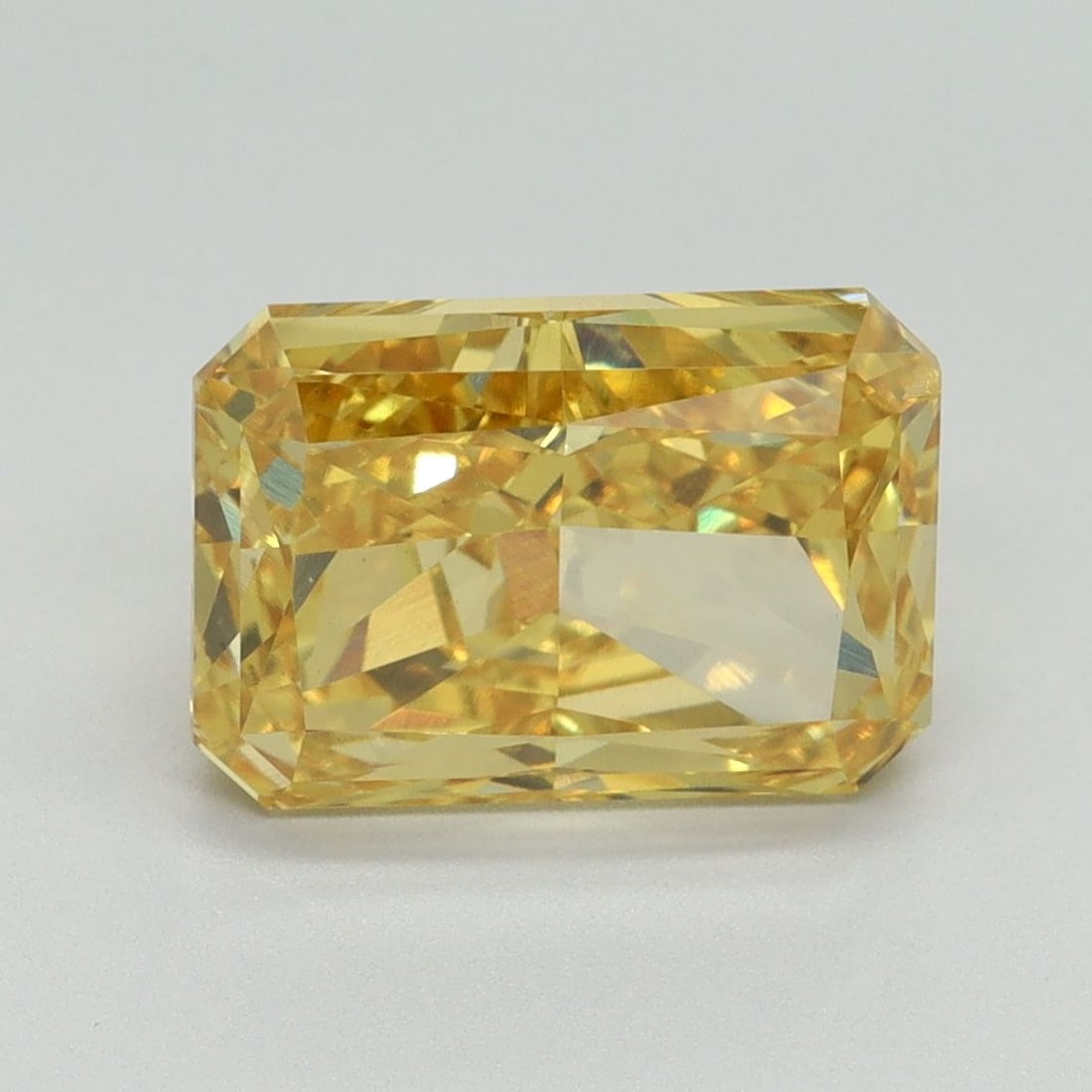 Loose Diamond - RADIANT 3.53ct Fancy Vivid Yellow SI1: Loose Diamond - RADIANT 3.53ct Fancy Vivid Yellow SI1 Source: This is a real non-mined Diamond that has been grown in a lab Shape: RADIANT Carats: 3.53 Color: Fancy Vivid Yellow Certification: IGI Vid