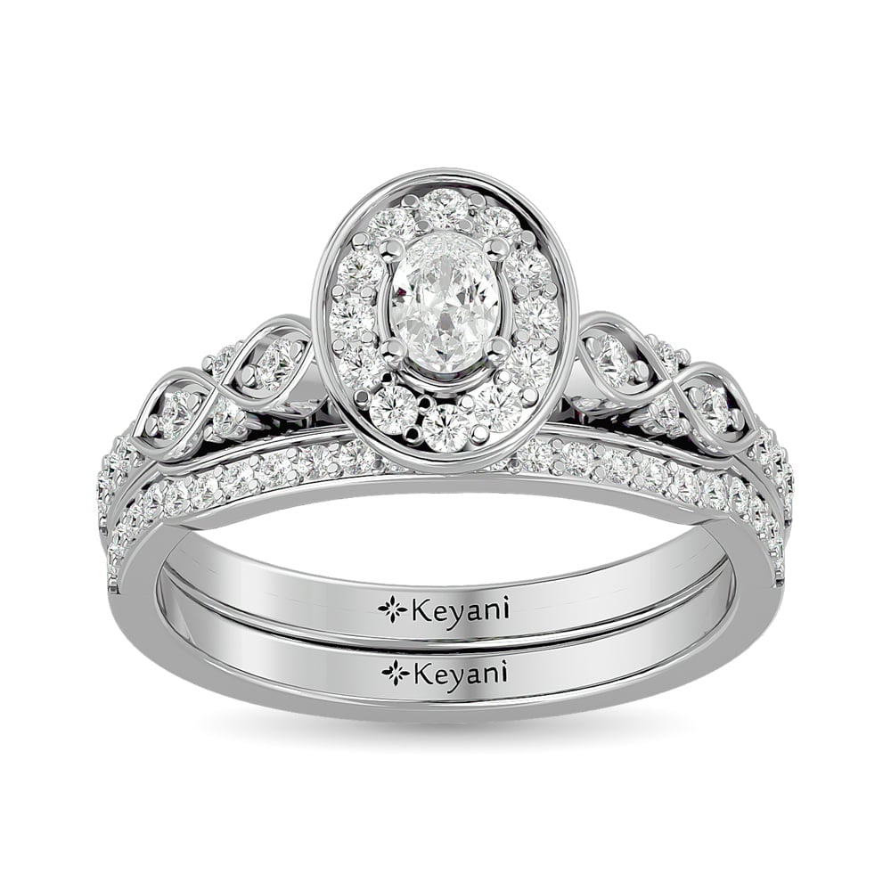 Diamond 5/8 Ct.Tw. Oval Cut Bridal Ring in 14K White Gold: Diamond 5/8 Ct.Tw. Oval Cut Bridal Ring in 14K White Gold 14k White Gold Stone Color: G-h Stone Clarity: Si2 Each ring is presented in standard size 6.5. Complimentary resizing is available between si
