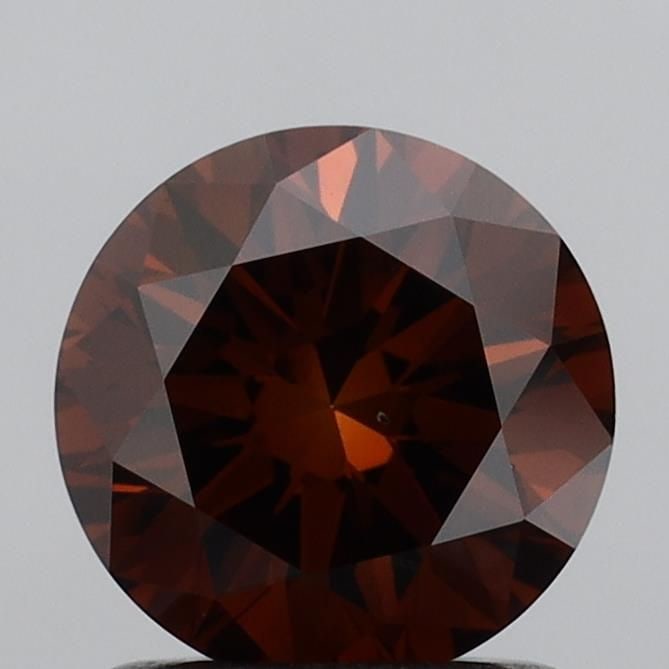 Loose Diamond - ROUND 1.19ct Fancy Deep Orange VS2: Loose Diamond - ROUND 1.19ct Fancy Deep Orange VS2 Source: This is a real non-mined Diamond that has been grown in a lab Shape: ROUND Carats: 1.19 Color: Fancy Deep Orange Certification: IGI Video: