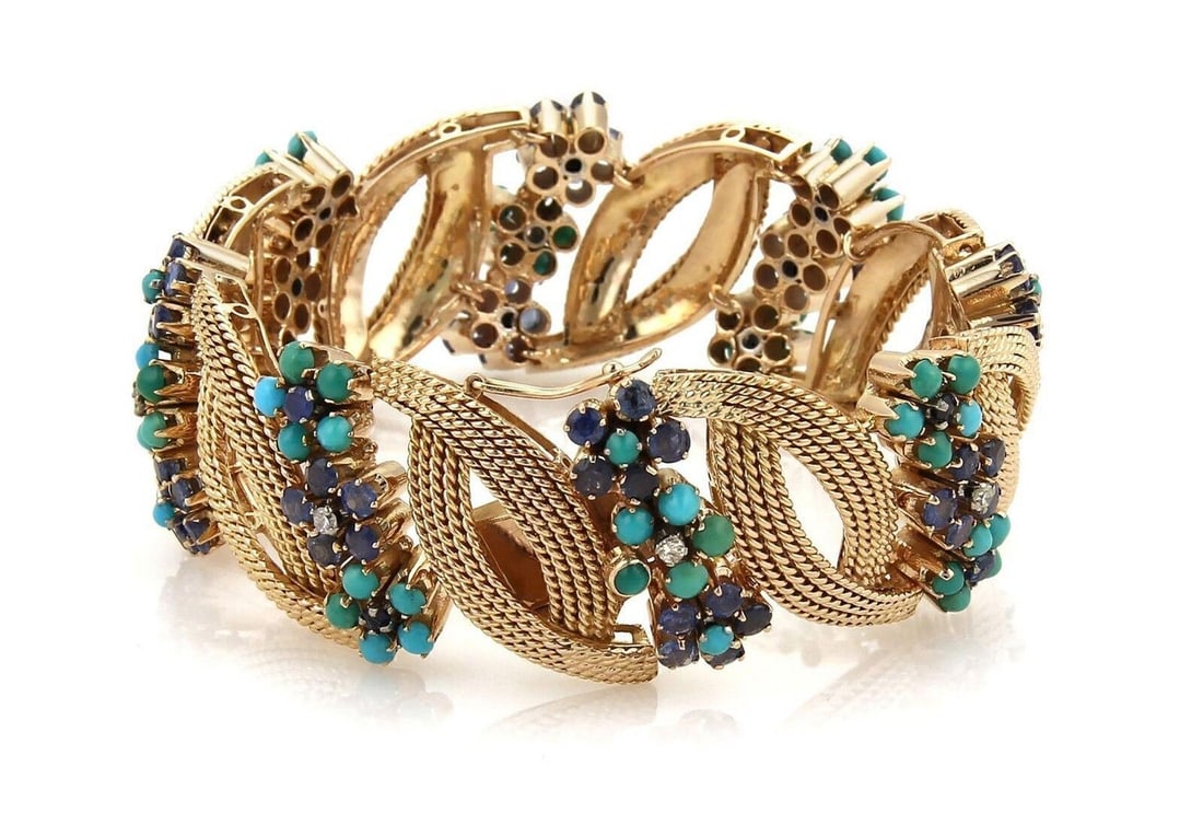 Chain Bracelet with Diamonds Sapphires and Turquoise in 14k Rose Gold: Chain Bracelet with Diamonds Sapphires and Turquoise in 14k Rose Gold This vintage chain bracelet is crafted from 14k rose gold and features sparkling sapphires, turquoise accents, and a total