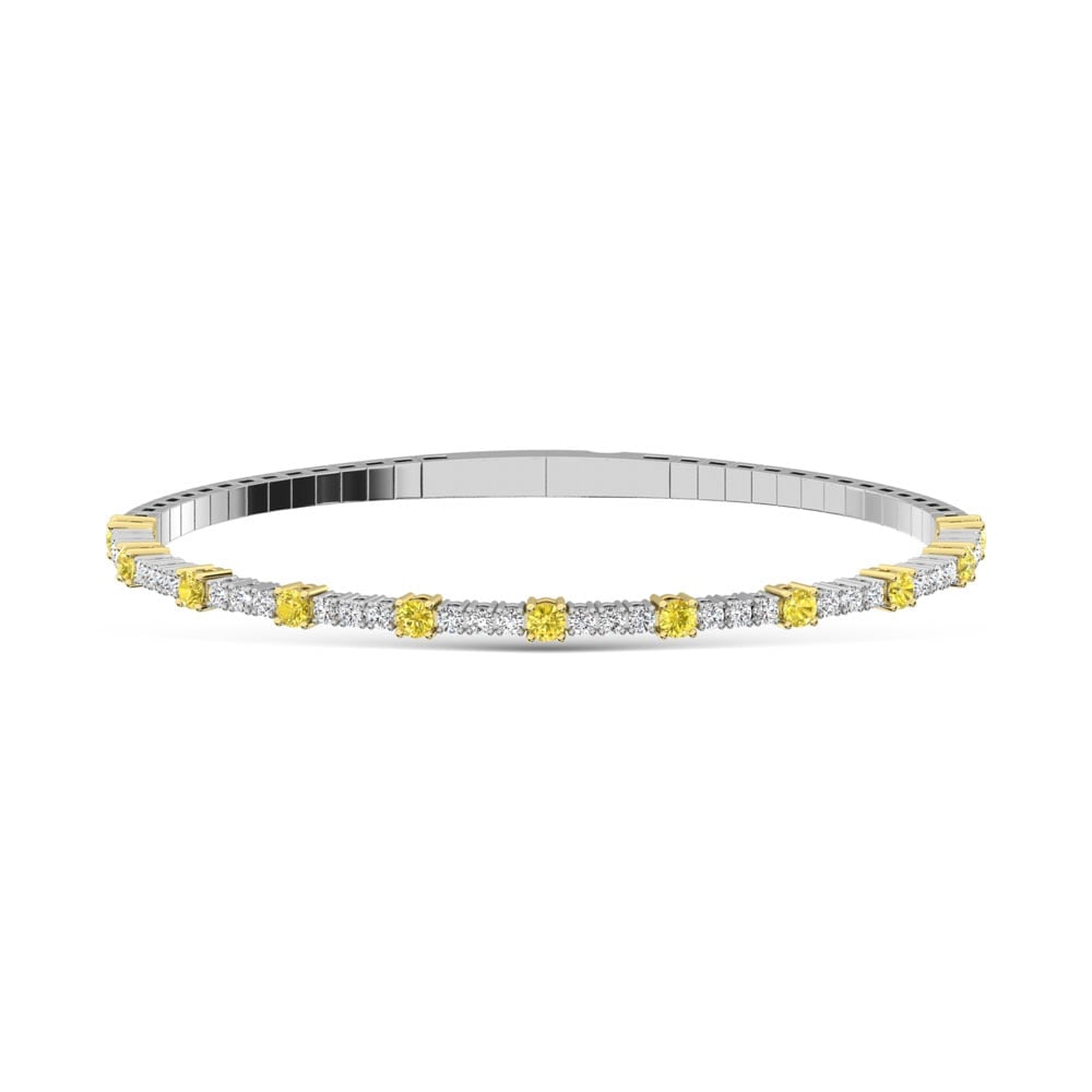 14K White Gold Lab Grown Yellow and White Diamond 1 1/6 Ct.Tw Flexi Bangle: 14K White Gold Lab Grown Yellow and White Diamond 1 1/6 Ct.Tw Flexi Bangle Crafted in 14K White Gold, this flexi bangle features lab grown yellow and white diamonds totaling 1 1/6 Ct.Tw., radiating ch