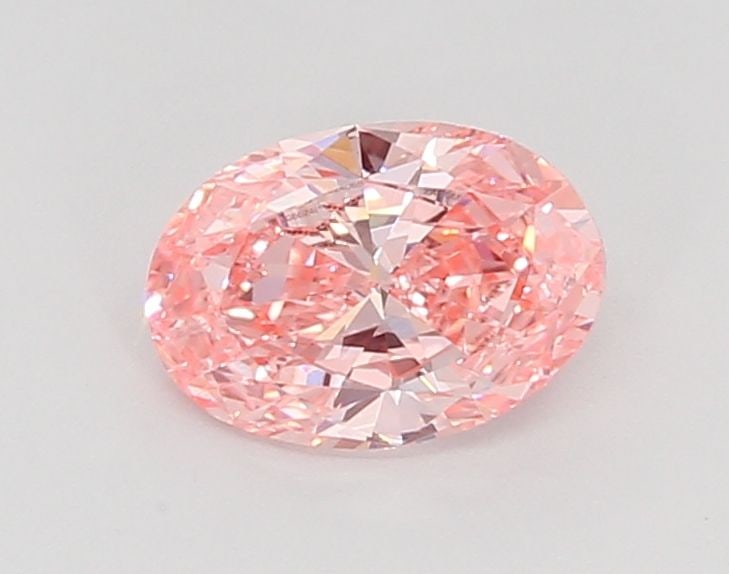 Loose Diamond - OVAL 0.78ct Fancy Vivid Pink VS1: Loose Diamond - OVAL 0.78ct Fancy Vivid Pink VS1 Source: This is a real non-mined Diamond that has been grown in a lab Shape: OVAL Carats: 0.78 Color: Fancy Vivid Pink Certification: IGI Video: