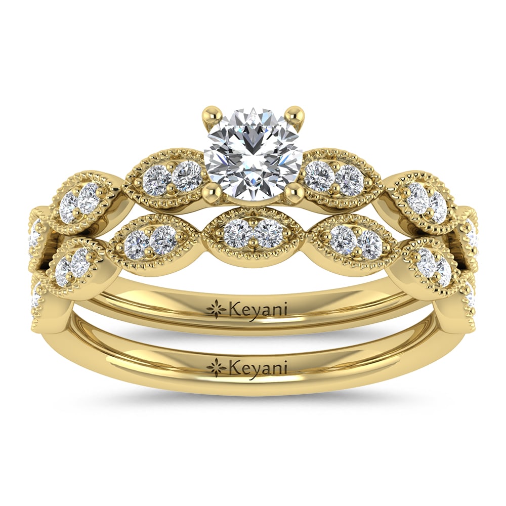 Diamond 1/2 Ct.Tw. Round Cut Bridal Ring in 14K Yellow Gold: Diamond 1/2 Ct.Tw. Round Cut Bridal Ring in 14K Yellow Gold 14k Yellow Gold Stone Color: G-h Stone Clarity: Si2 Each ring is presented in standard size 6.5. Complimentary resizing is available between