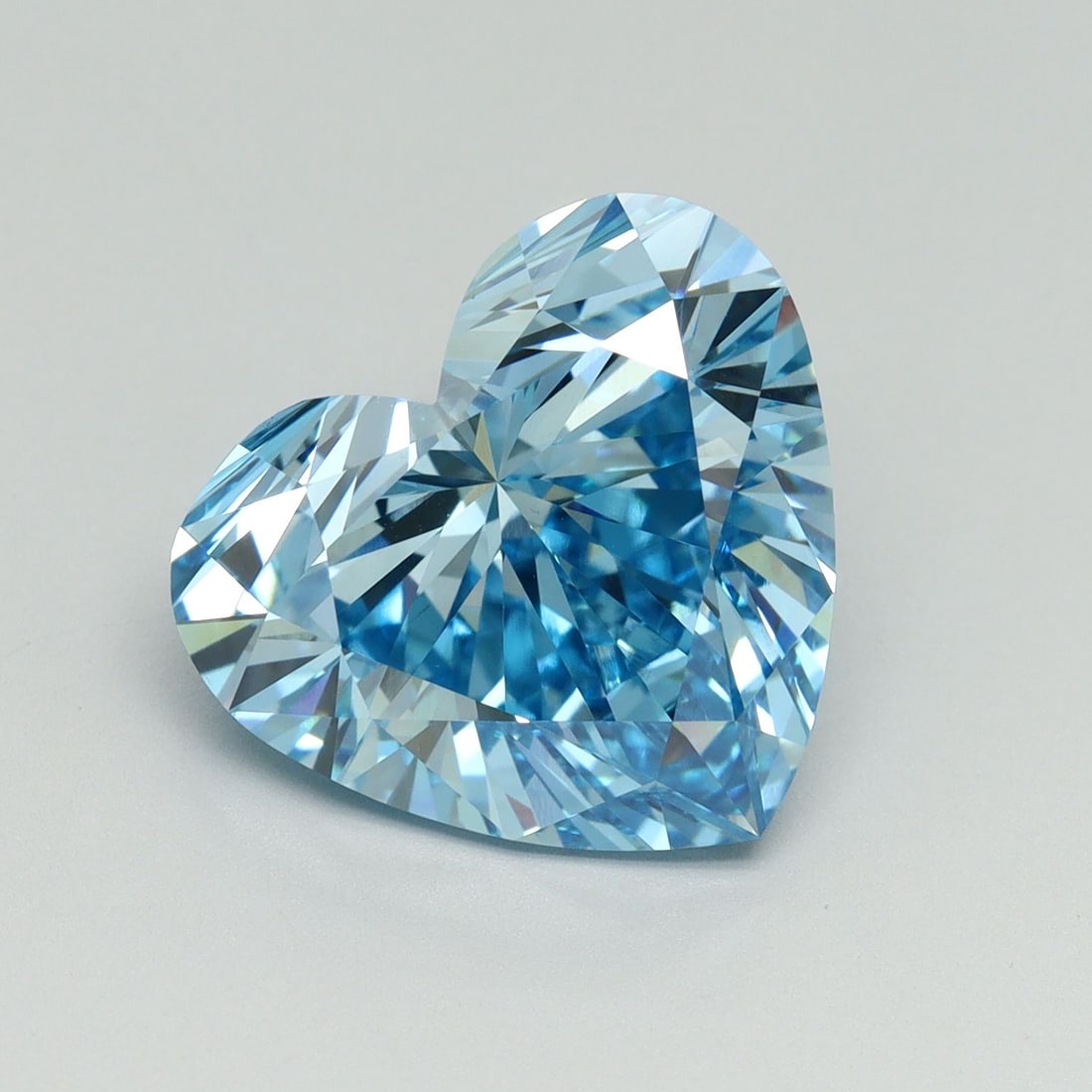 Loose Diamond - HEART 7.05ct Fancy Vivid Blue VS1: Loose Diamond - HEART 7.05ct Fancy Vivid Blue VS1 Source: This is a real non-mined Diamond that has been grown in a lab Shape: HEART Carats: 7.05 Color: Fancy Vivid Blue Certification: IGI Video: