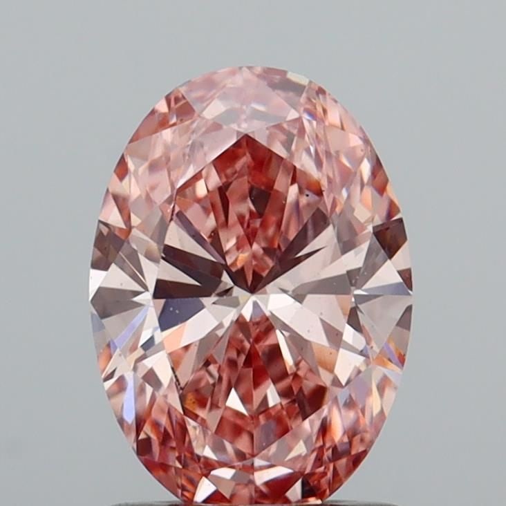 Loose Diamond - OVAL 1.03ct Fancy Vivid Brownish Pink VS2: Loose Diamond - OVAL 1.03ct Fancy Vivid Brownish Pink VS2 Source: This is a real non-mined Diamond that has been grown in a lab Shape: OVAL Carats: 1.03 Color: Fancy Vivid Brownish Pink