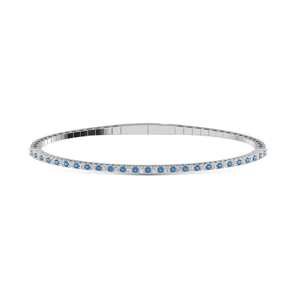 14K White Gold 1 Ct.Tw. Alternate white and Blue Lab Grown Diamond Bangle: 14K White Gold 1 Ct.Tw. Alternate white and Blue Lab Grown Diamond Bangle This 14K White Gold bangle showcases alternate white and blue lab grown diamonds totaling 1 Ct.Tw., delivering elegant color c