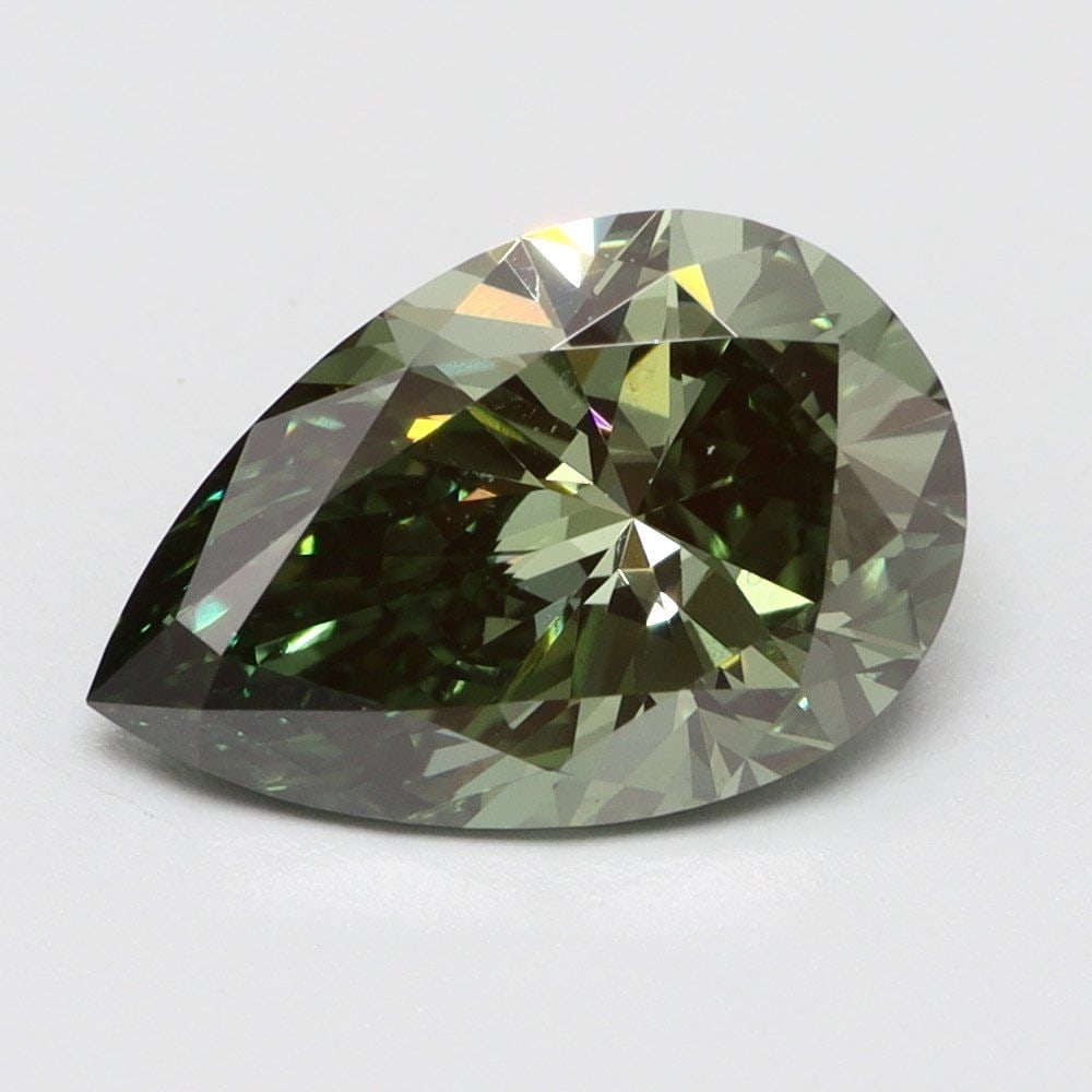 Loose Diamond - PEAR 1.0ct Fancy Vivid Green VS1: Loose Diamond - PEAR 1.0ct Fancy Vivid Green VS1 Source: This is a real non-mined Diamond that has been grown in a lab Shape: PEAR Carats: 1.0 Color: Fancy Vivid Green Certification: NONE Video: