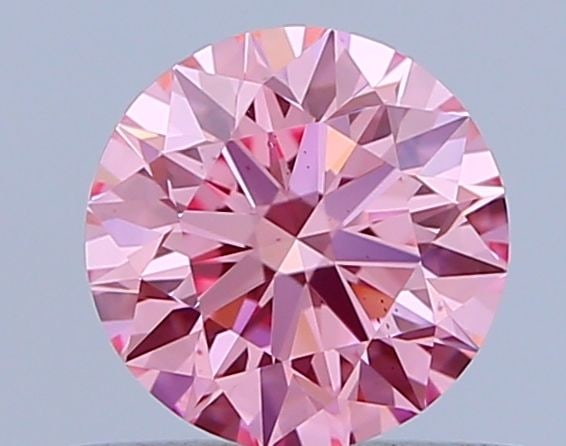 Ideal Loose Diamond - ROUND 0.65ct Fancy Vivid Pink VS2: Ideal Loose Diamond - ROUND 0.65ct Fancy Vivid Pink VS2 Source: This is a real non-mined Diamond that has been grown in a lab Shape: ROUND Carats: 0.65 Color: Fancy Vivid Pink Certification: IGI