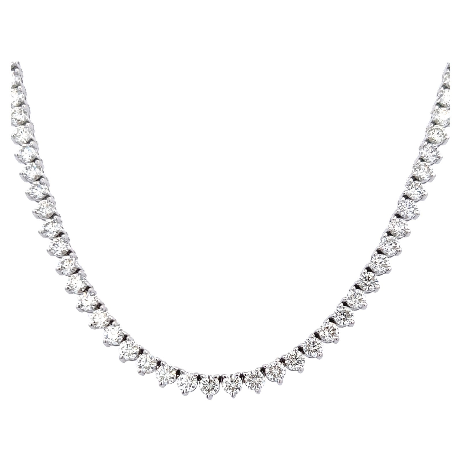13.48ct Diamond Tennis Necklace 18k White Gold: 13.48ct Diamond Tennis Necklace 18k White Gold This stunning 13.48ct Diamond Three-Prong Tennis Necklace is crafted from 18k white gold, showcasing a total of 119 round brilliant diamonds. With an imp