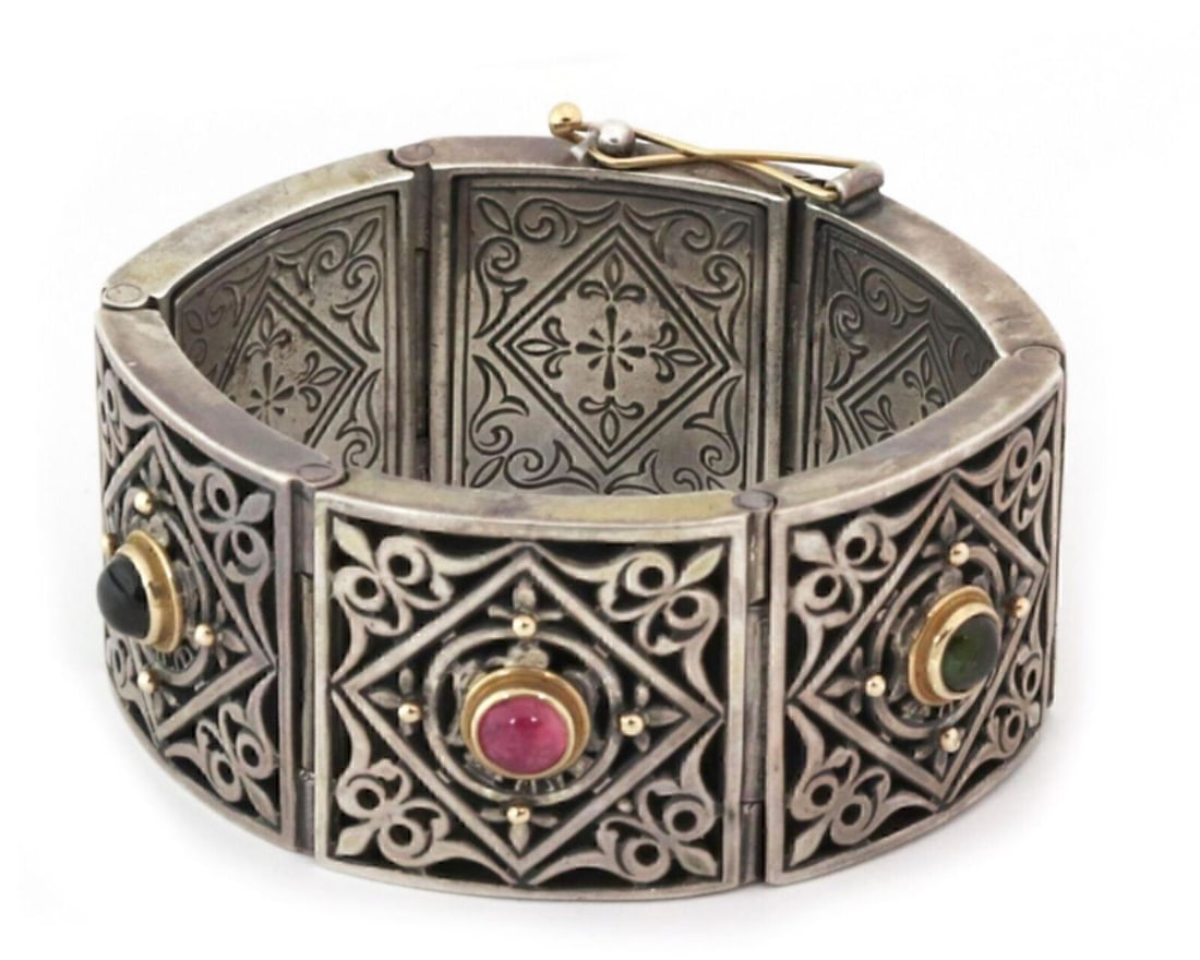 Tourmaline Hinged Bangle Bracelet in 18k Gold and Sterling by Konstantino: Tourmaline Hinged Bangle Bracelet in 18k Gold and Sterling by Konstantino This Konstantino wide hinge bracelet features a bangle style design crafted from sterling silver and 18k yellow gold. The brac