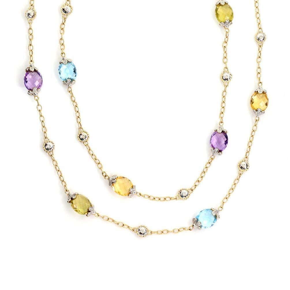 Elegant 37" 14k Two Tone Gold Floral Necklace with Diamonds and Multicolor Gems: Elegant 37" 14k Two Tone Gold Floral Necklace with Diamonds and Multicolor Gems This exquisite necklace showcases a stunning combination of 14k yellow and white gold, featuring a fine textured finish.