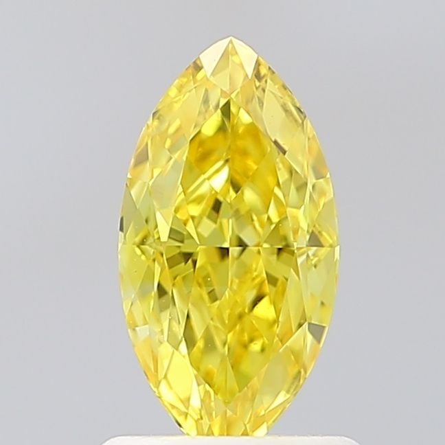 Loose Diamond - MARQUISE 1.04ct Fancy Vivid Yellow VVS1: Loose Diamond - MARQUISE 1.04ct Fancy Vivid Yellow VVS1 Source: This is a real non-mined Diamond that has been grown in a lab Shape: MARQUISE Carats: 1.04 Color: Fancy Vivid Yellow Certification: IGI