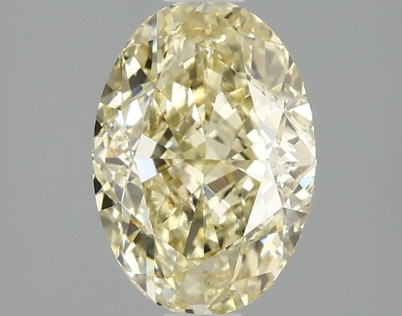 Loose Diamond - OVAL 2.11ct Fancy Intense Yellow VS1: Loose Diamond - OVAL 2.11ct Fancy Intense Yellow VS1 Source: This is a real non-mined Diamond that has been grown in a lab Shape: OVAL Carats: 2.11 Color: Fancy Intense Yellow Certification: IGI