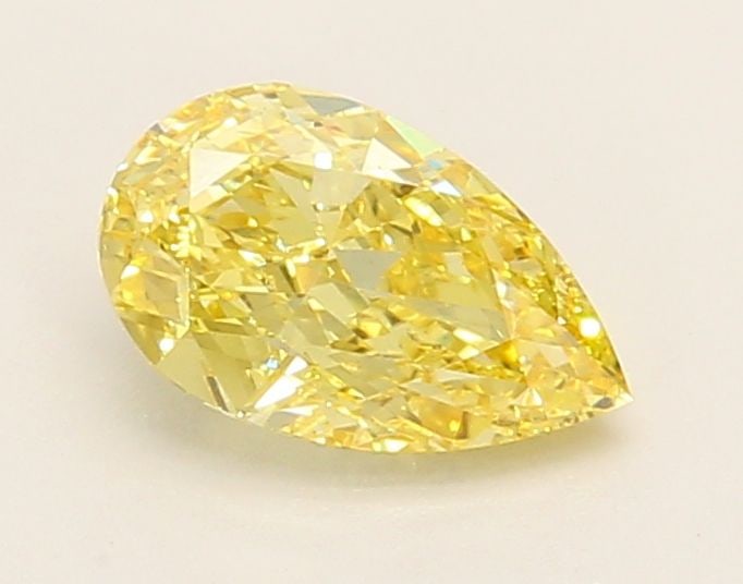 Loose Diamond - PEAR 0.96ct Fancy Vivid Yellow VS2: Loose Diamond - PEAR 0.96ct Fancy Vivid Yellow VS2 Source: This is a real non-mined Diamond that has been grown in a lab Shape: PEAR Carats: 0.96 Color: Fancy Vivid Yellow Certification: IGI Video: