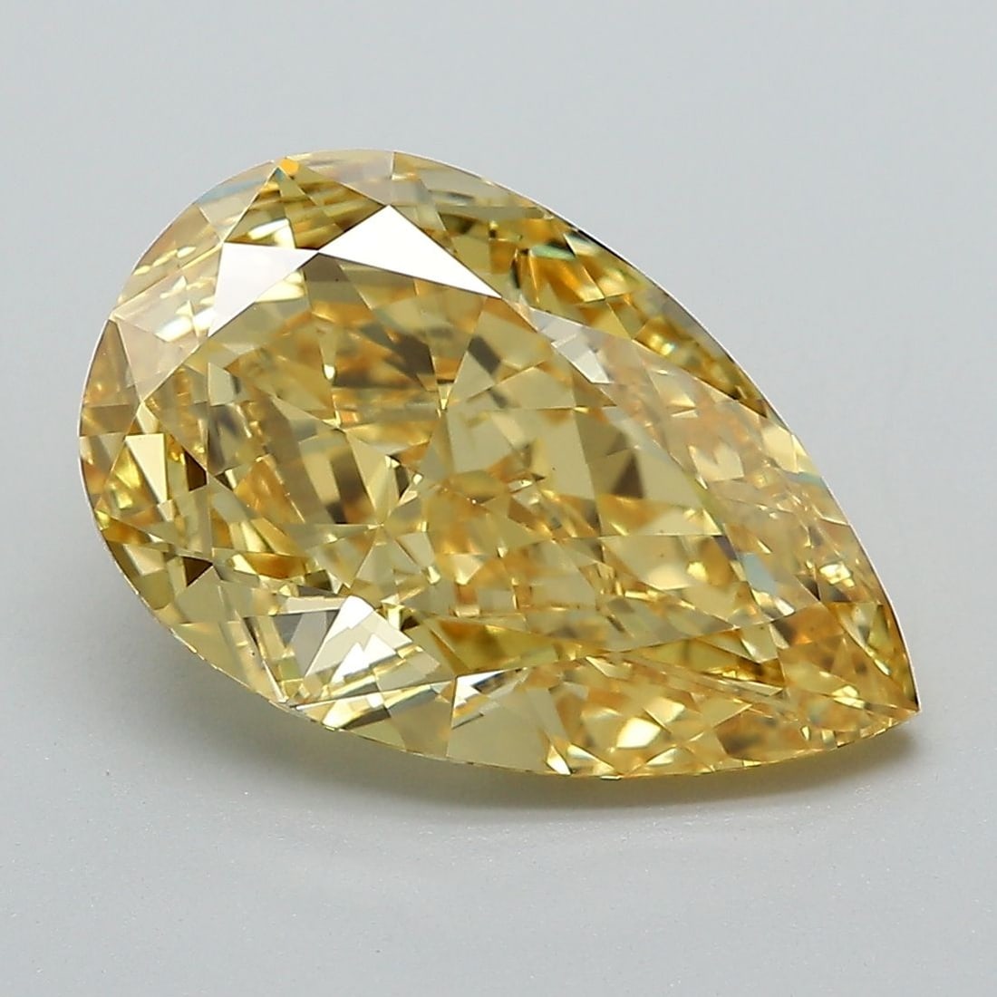 Loose Diamond - PEAR 4.53ct Fancy Vivid Yellow VS1: Loose Diamond - PEAR 4.53ct Fancy Vivid Yellow VS1 Source: This is a real non-mined Diamond that has been grown in a lab Shape: PEAR Carats: 4.53 Color: Fancy Vivid Yellow Certification: IGI Video: