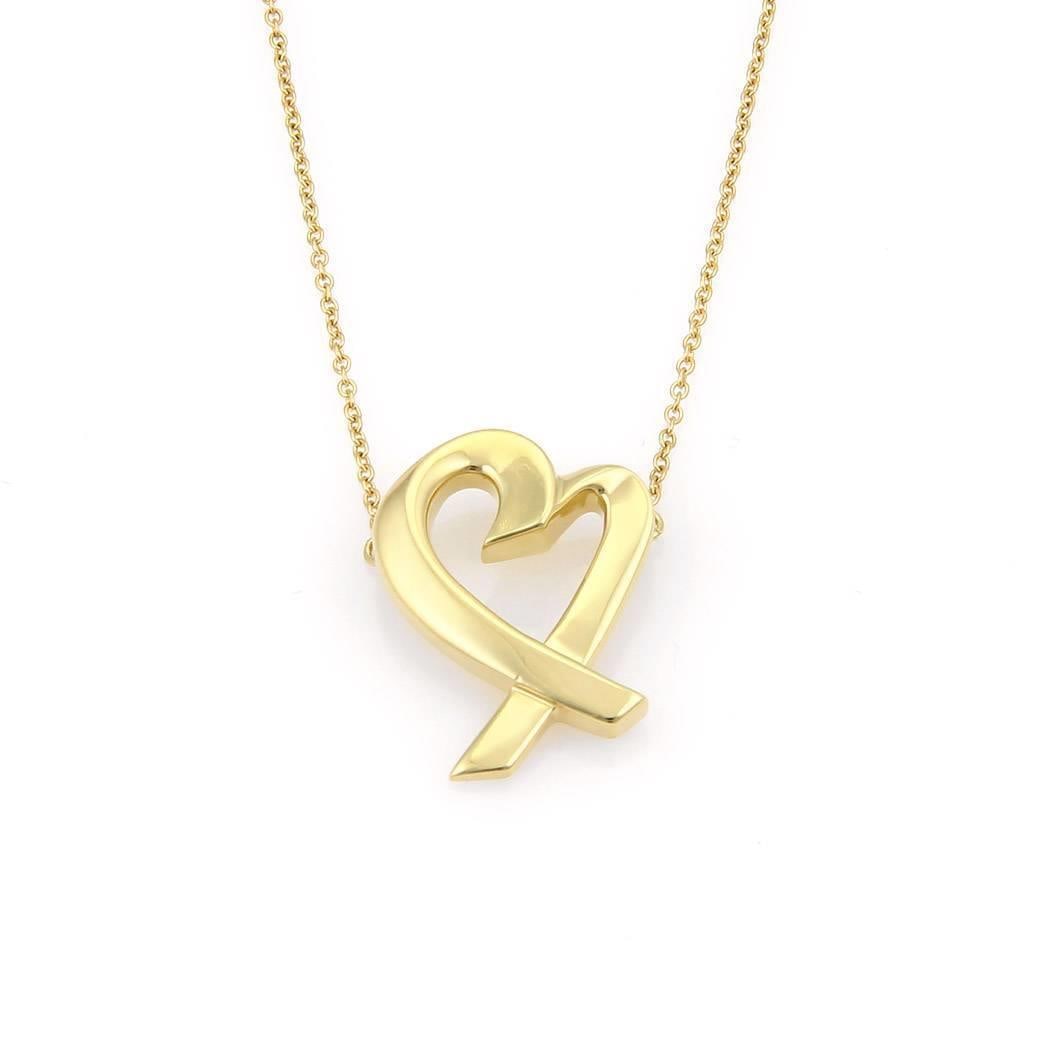 Tiffany & Co. Paloma Picasso Heart Pendant 18k Yellow Gold Necklace: Tiffany & Co. Paloma Picasso Heart Pendant 18k Yellow Gold Necklace This exquisite necklace is an authentic piece from Tiffany & Co., designed by Paloma Picasso as part of the Loving Heart collection.