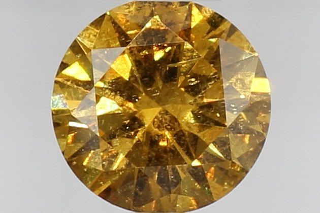 Loose Diamond - ROUND 0.5ct Fancy Deep Brownish Orangey Yellow: Loose Diamond - ROUND 0.5ct Fancy Deep Brownish Orangey Yellow Source: Natural Shape: ROUND Carats: 0.5 Color: Fancy Deep Brownish Orangey Yellow Certification: GIA Video: