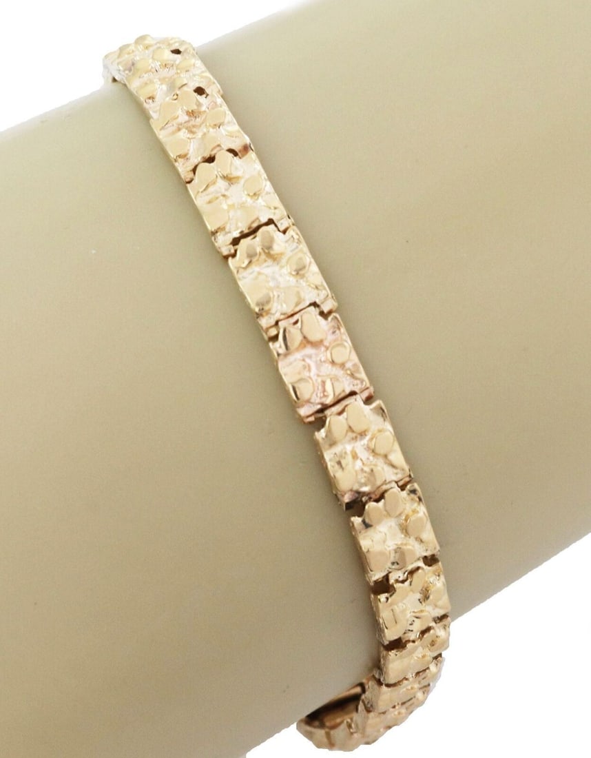 Vintage 14k Yellow Gold Nugget Rectangular Link Bracelet 8 Inch: Vintage 14k Yellow Gold Nugget Rectangular Link Bracelet 8 Inch This vintage rectangular link bracelet is crafted from solid 14k yellow gold and features a classic nugget-style design. The bracelet sh