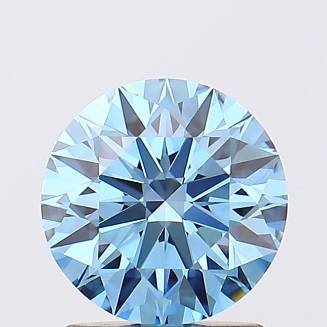 Ideal Loose Diamond - ROUND 1.55ct Fancy Vivid Blue VVS2: Ideal Loose Diamond - ROUND 1.55ct Fancy Vivid Blue VVS2 Source: This is a real non-mined Diamond that has been grown in a lab Shape: ROUND Carats: 1.55 Color: Fancy Vivid Blue Certification: IGI