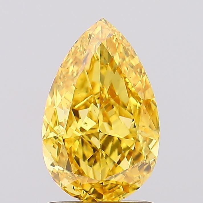 Loose Diamond - PEAR 1.7ct Fancy Vivid Yellow VS2: Loose Diamond - PEAR 1.7ct Fancy Vivid Yellow VS2 Source: This is a real non-mined Diamond that has been grown in a lab Shape: PEAR Carats: 1.7 Color: Fancy Vivid Yellow Certification: IGI Video: